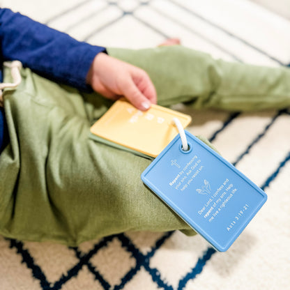 Boy with prayer cards