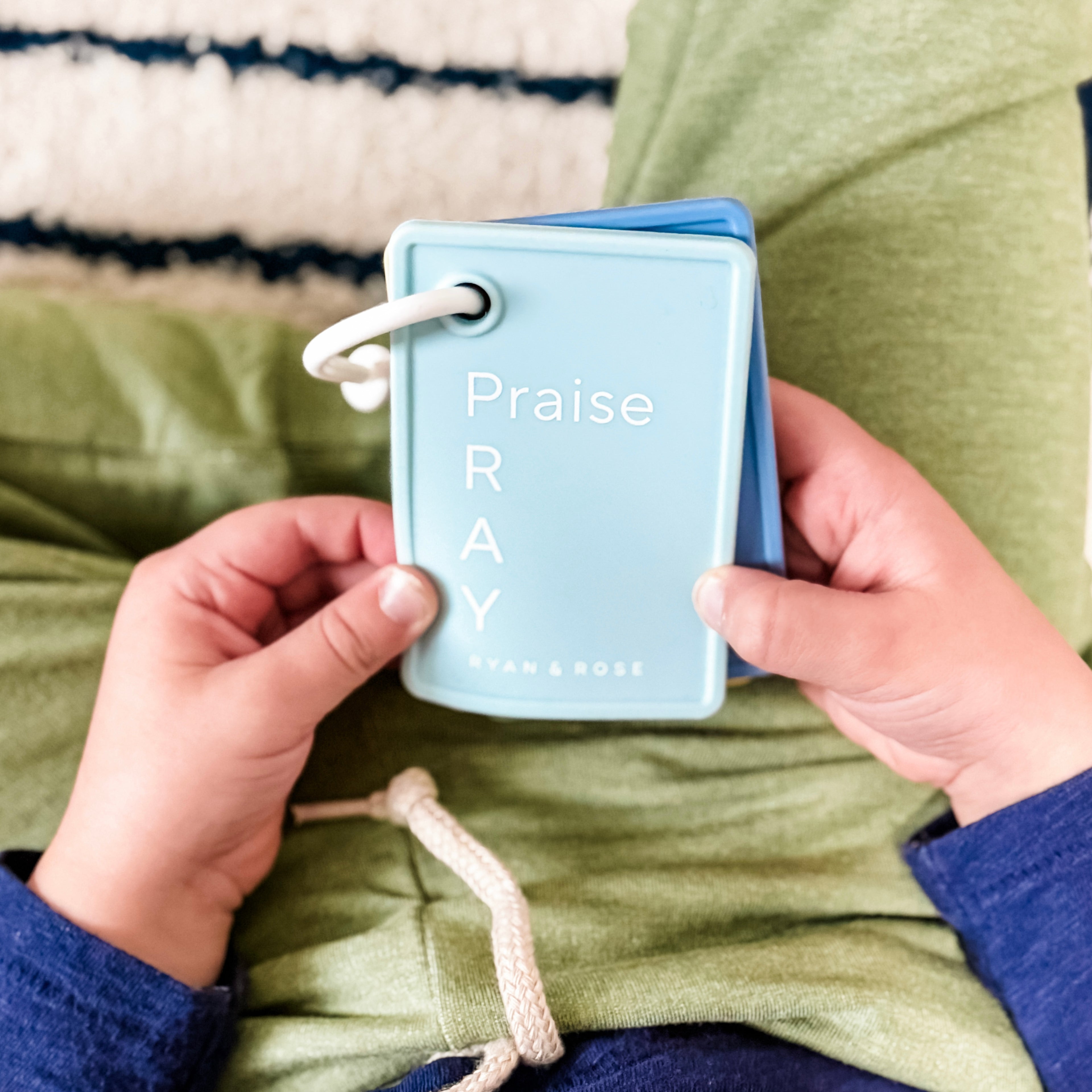 Boy with prayer cards