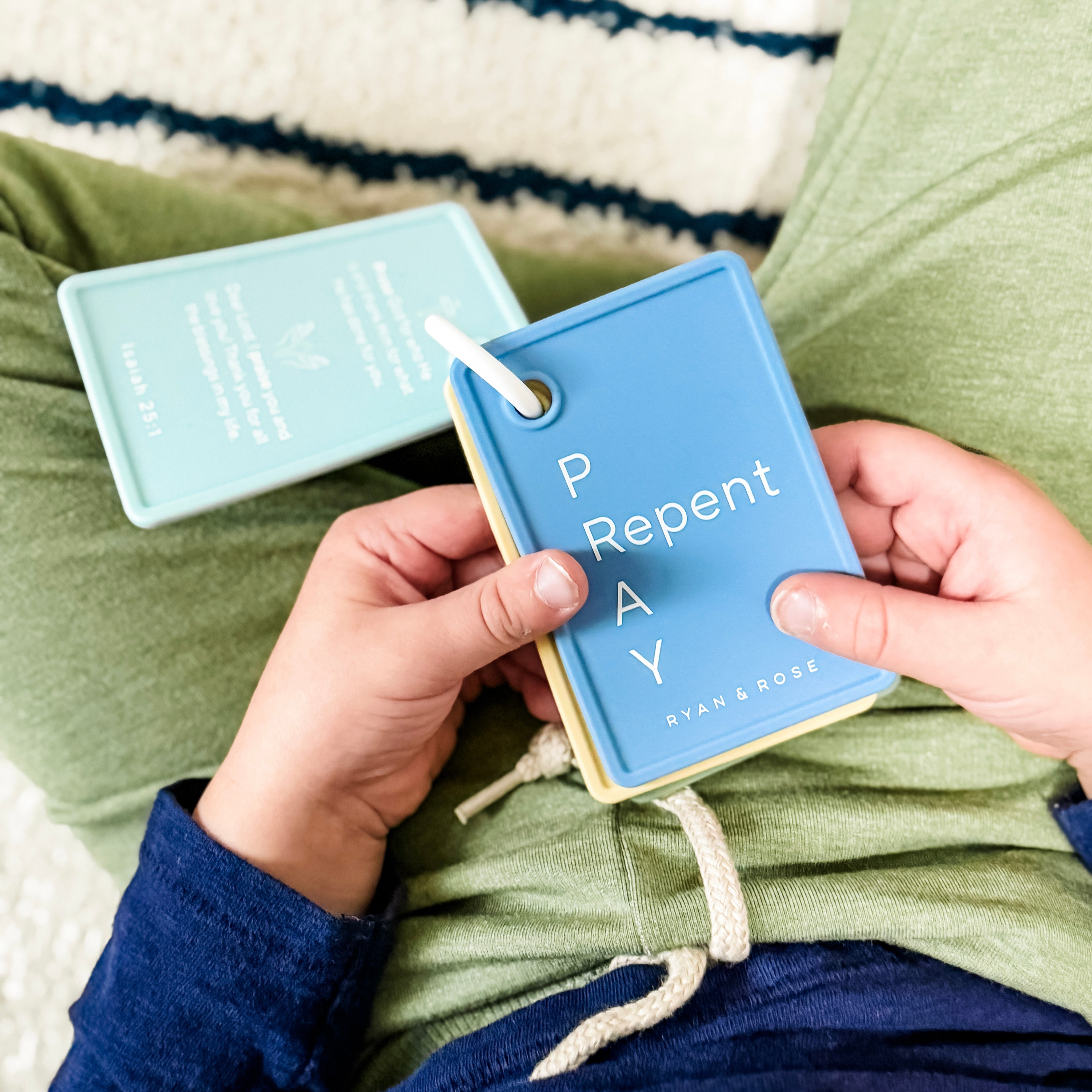 Boy with prayer cards