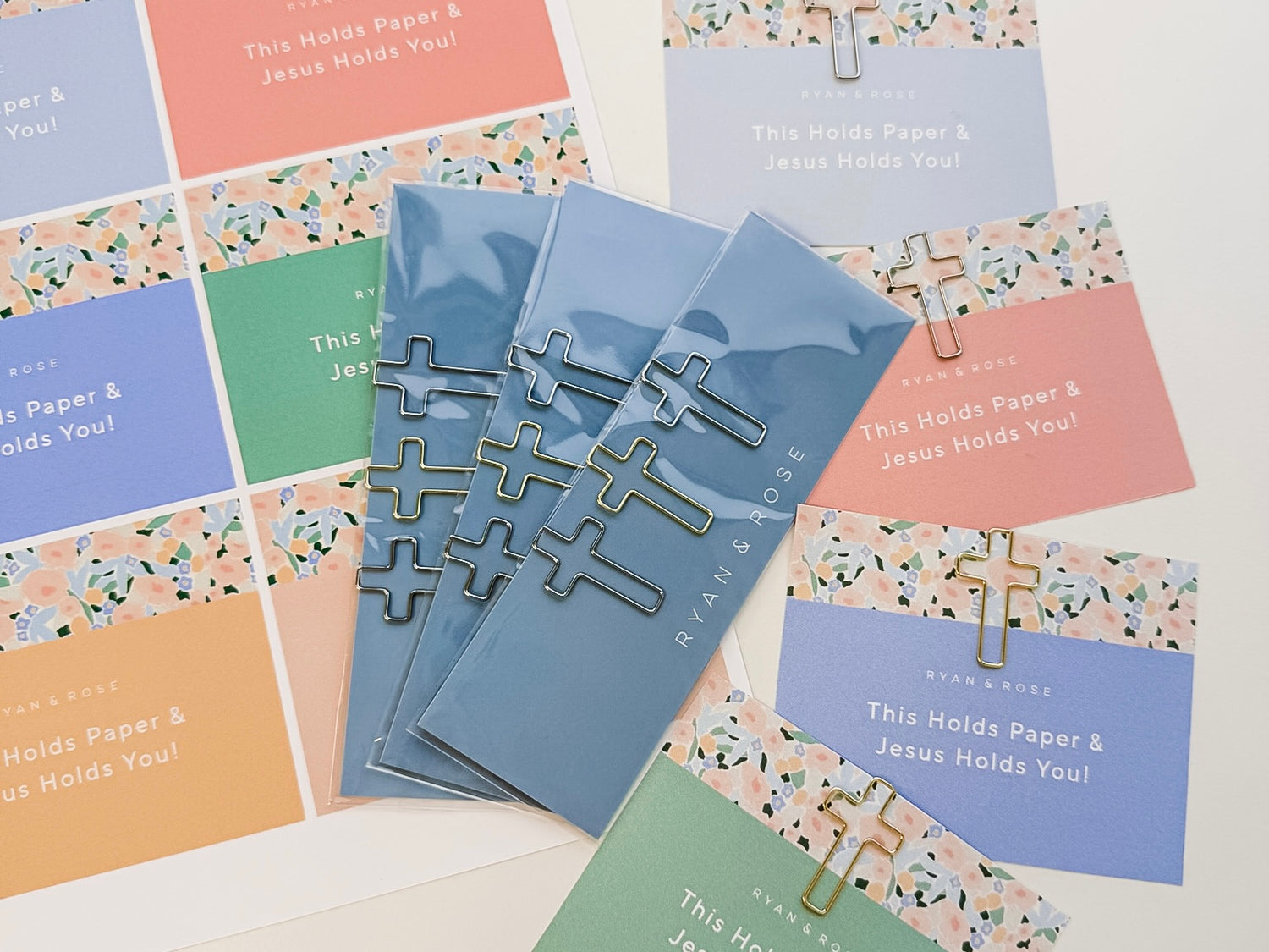 Set of paper clips with motivational message on a patterned background