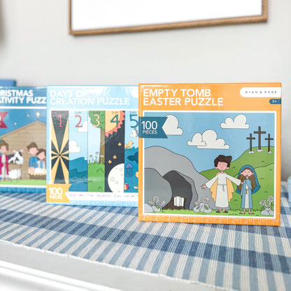 Three educational puzzles on a table with a white wall background