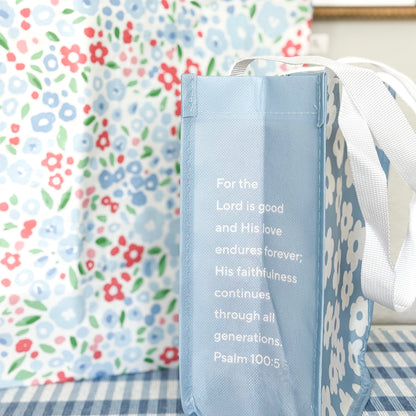 Blue bag with a verse on a floral background