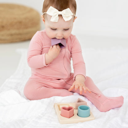 Baby playing with puzzle