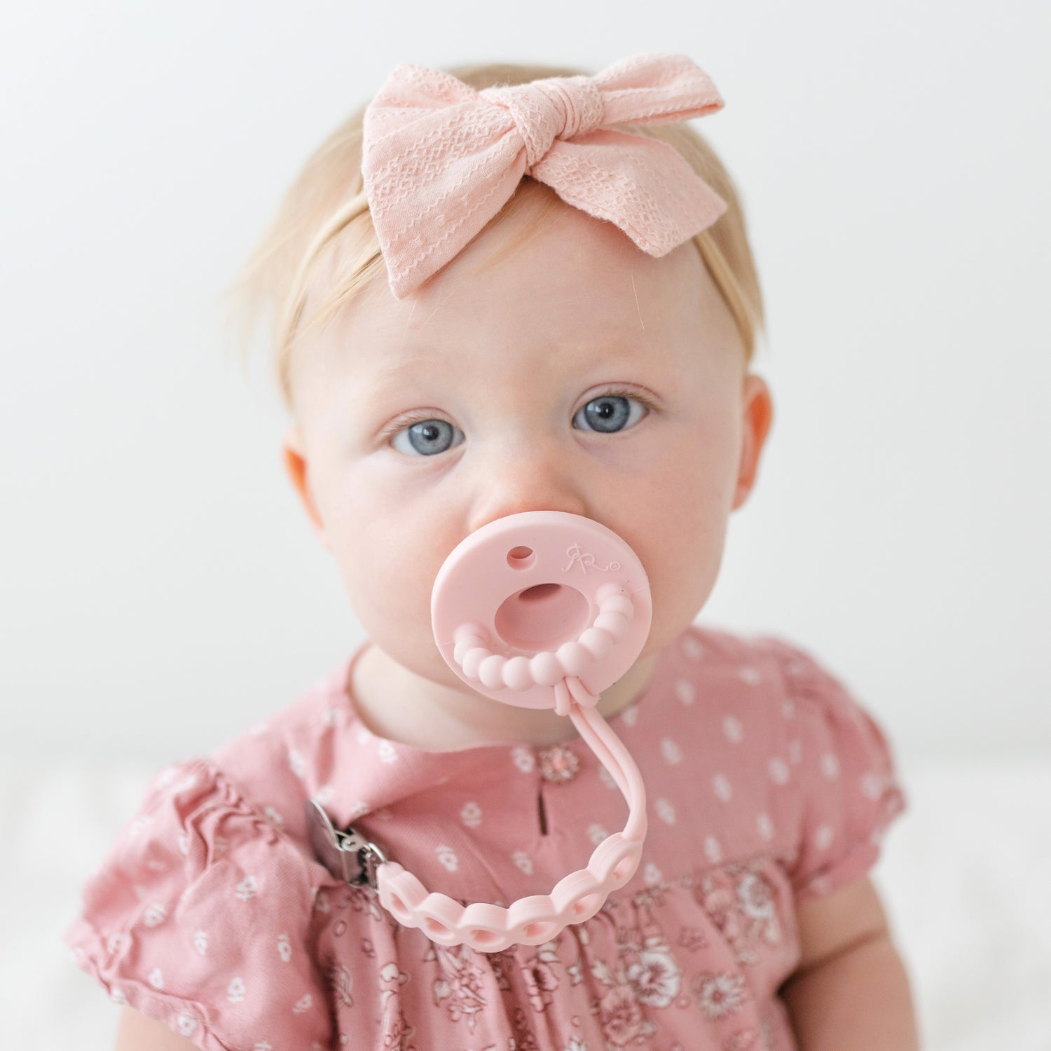 Baby girl wearing a Ballerina Cutie PAT and Hart Cutie Clip.