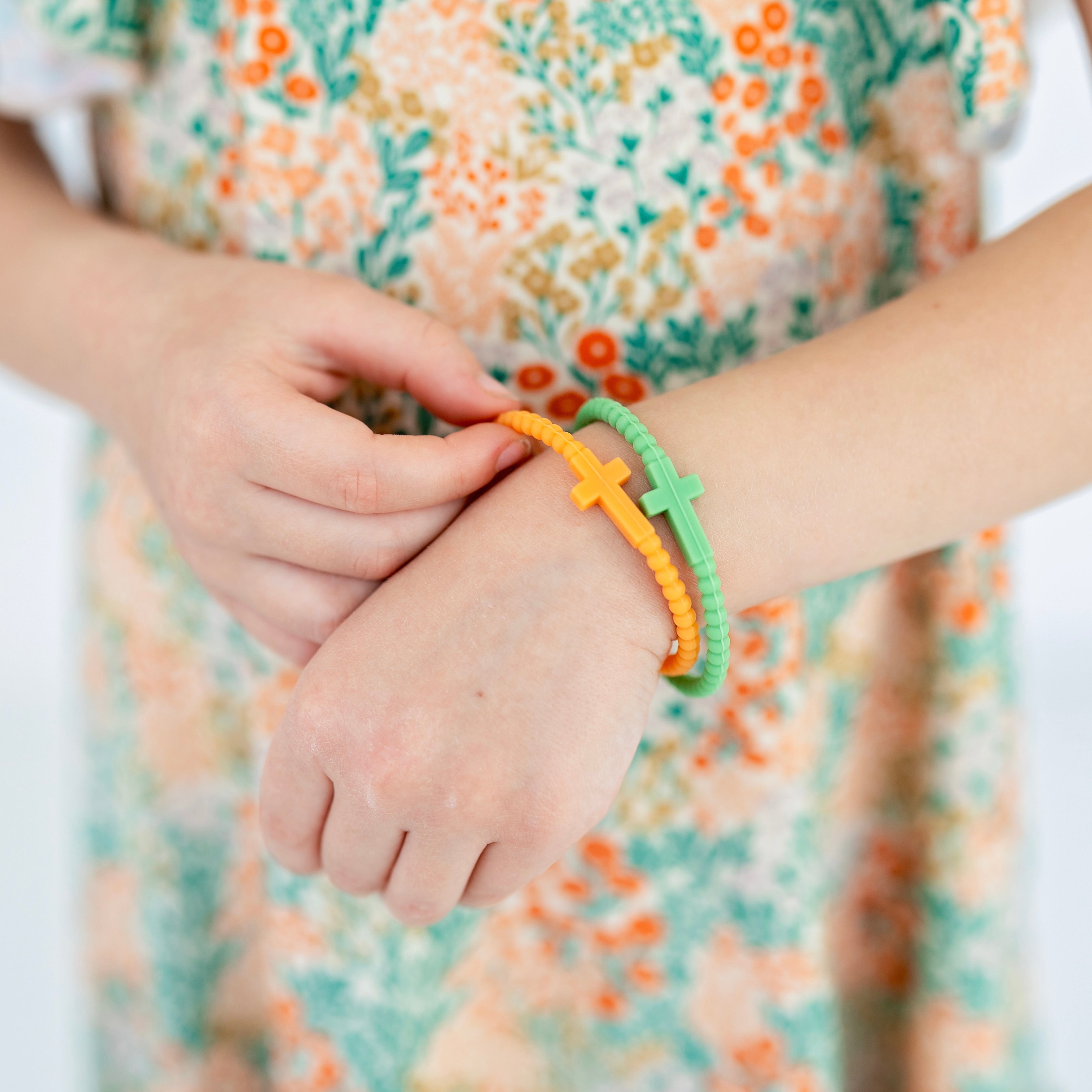 Girl wearing Jesus Bracelets